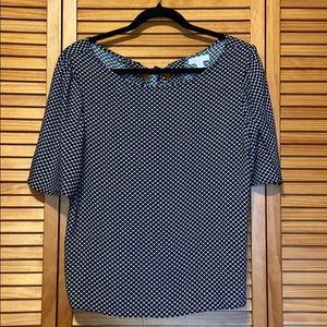 Polka dot blouse with bow tie back detailing